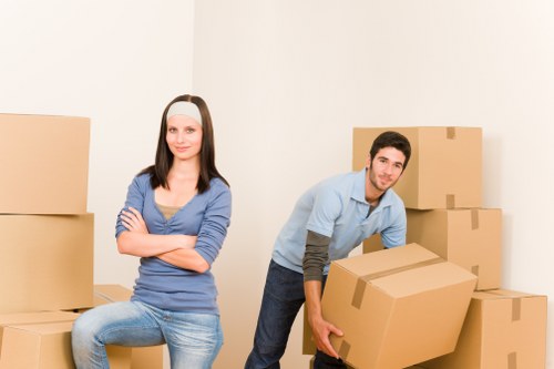 Experienced professionals managing office furniture move.