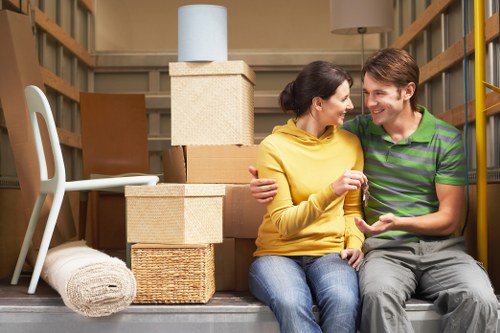 Professional office movers handling equipment
